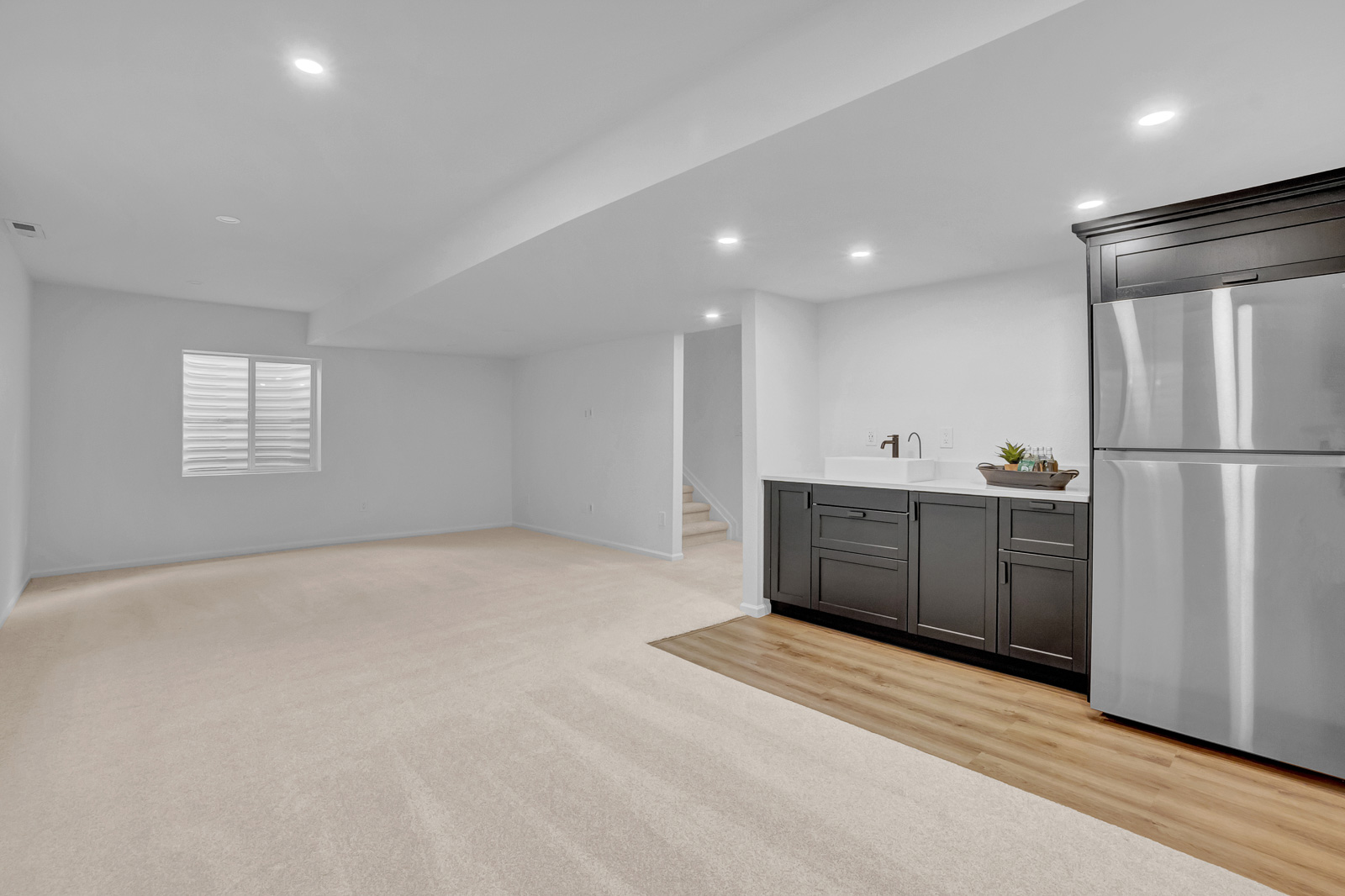 Living room real estate photography with natural light and open layout in Colorado