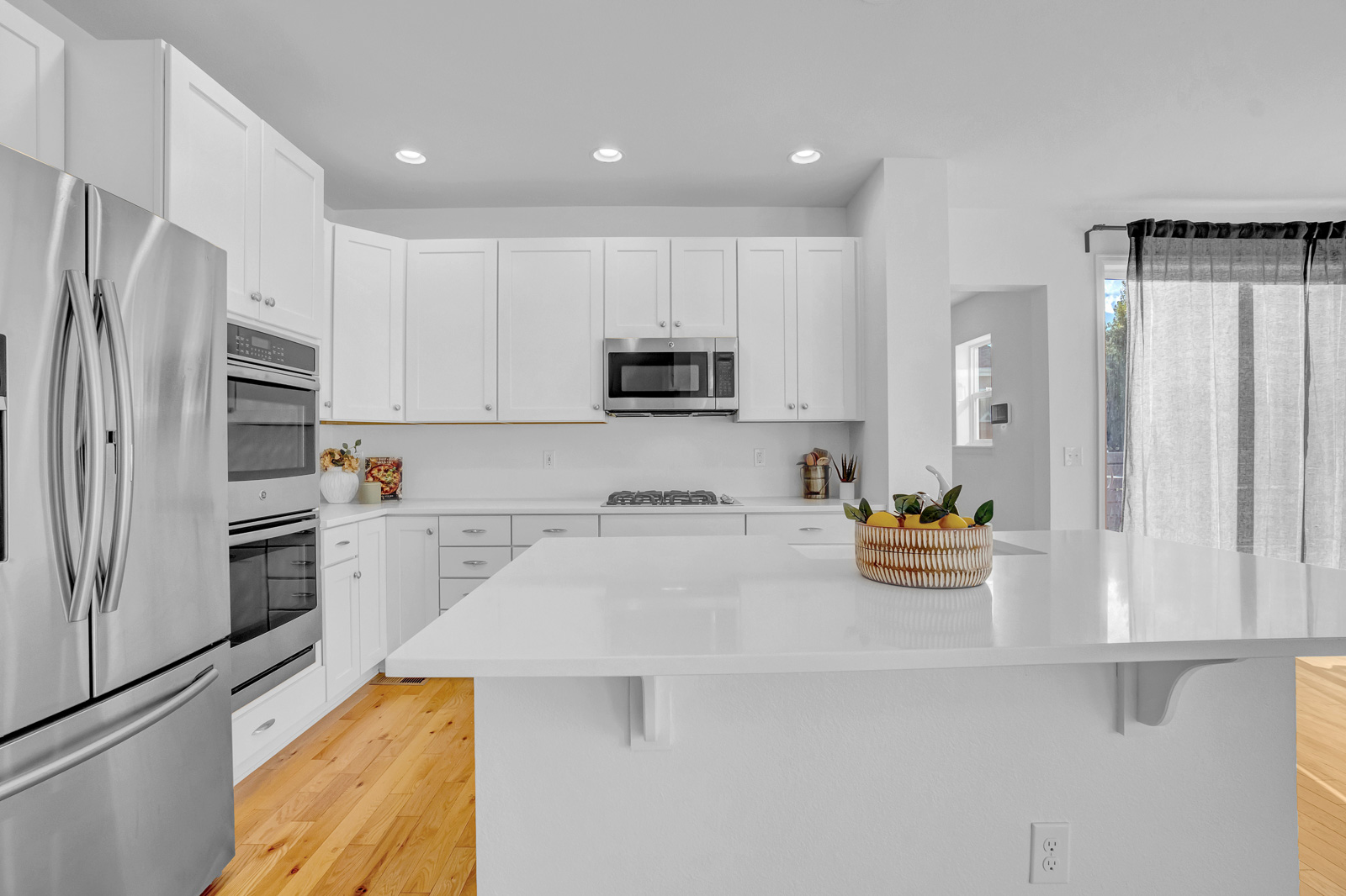Kitchen real estate photography with modern finishes and natural light in Colorado
