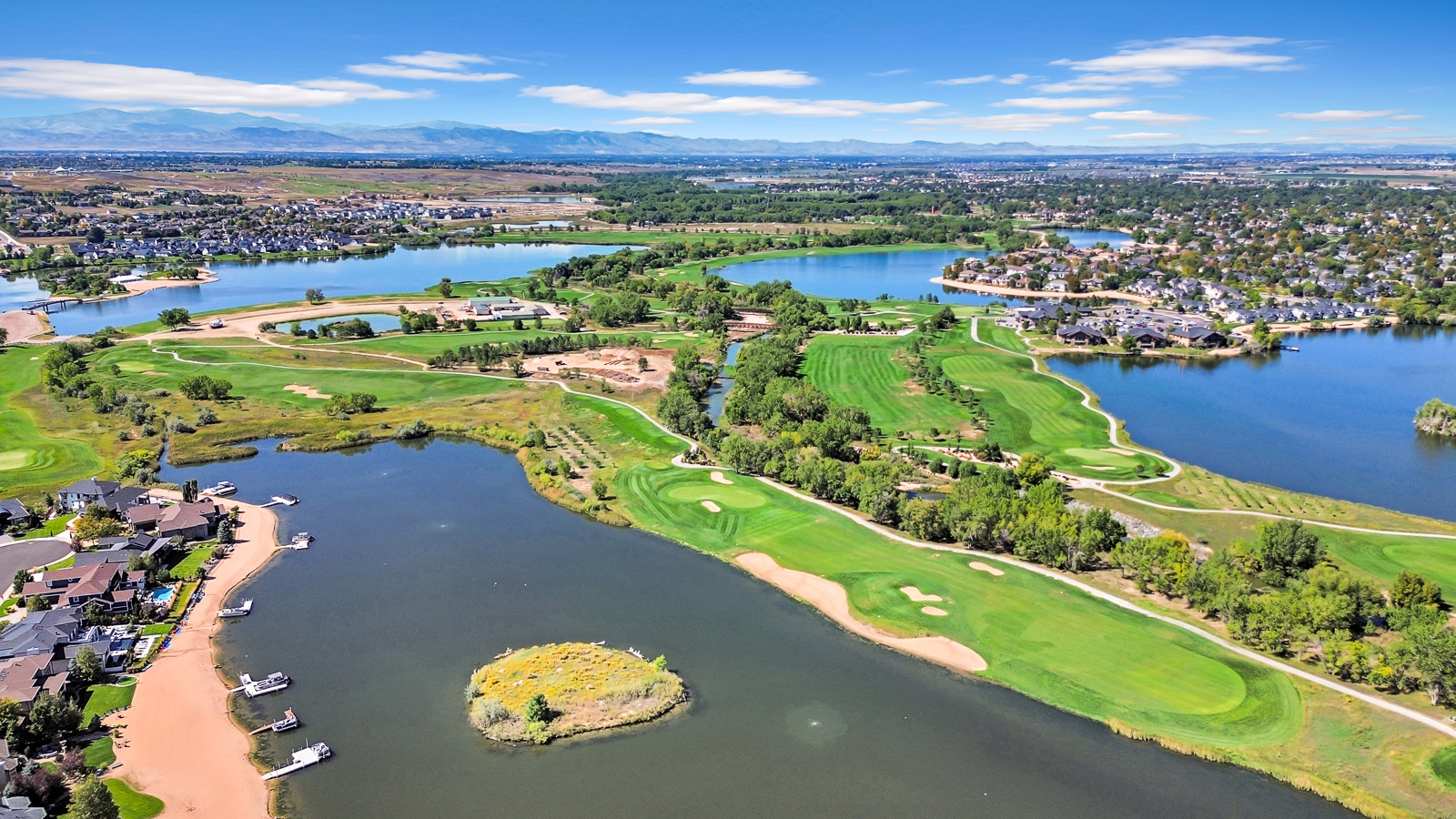 Aerial real estate photography of a residential property and surrounding area in Colorado