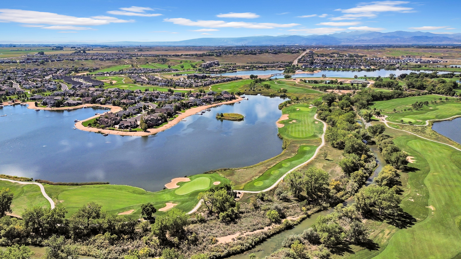 Aerial real estate photography of a residential property and surrounding area in Colorado