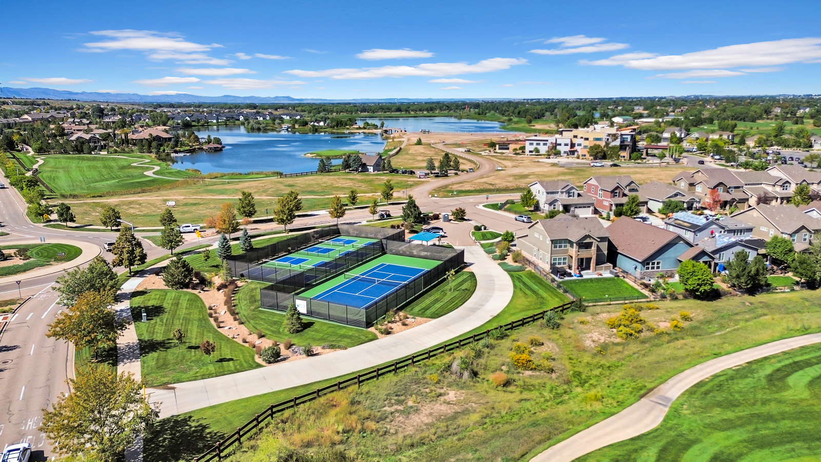 Aerial real estate photography of a residential property and surrounding area in Colorado