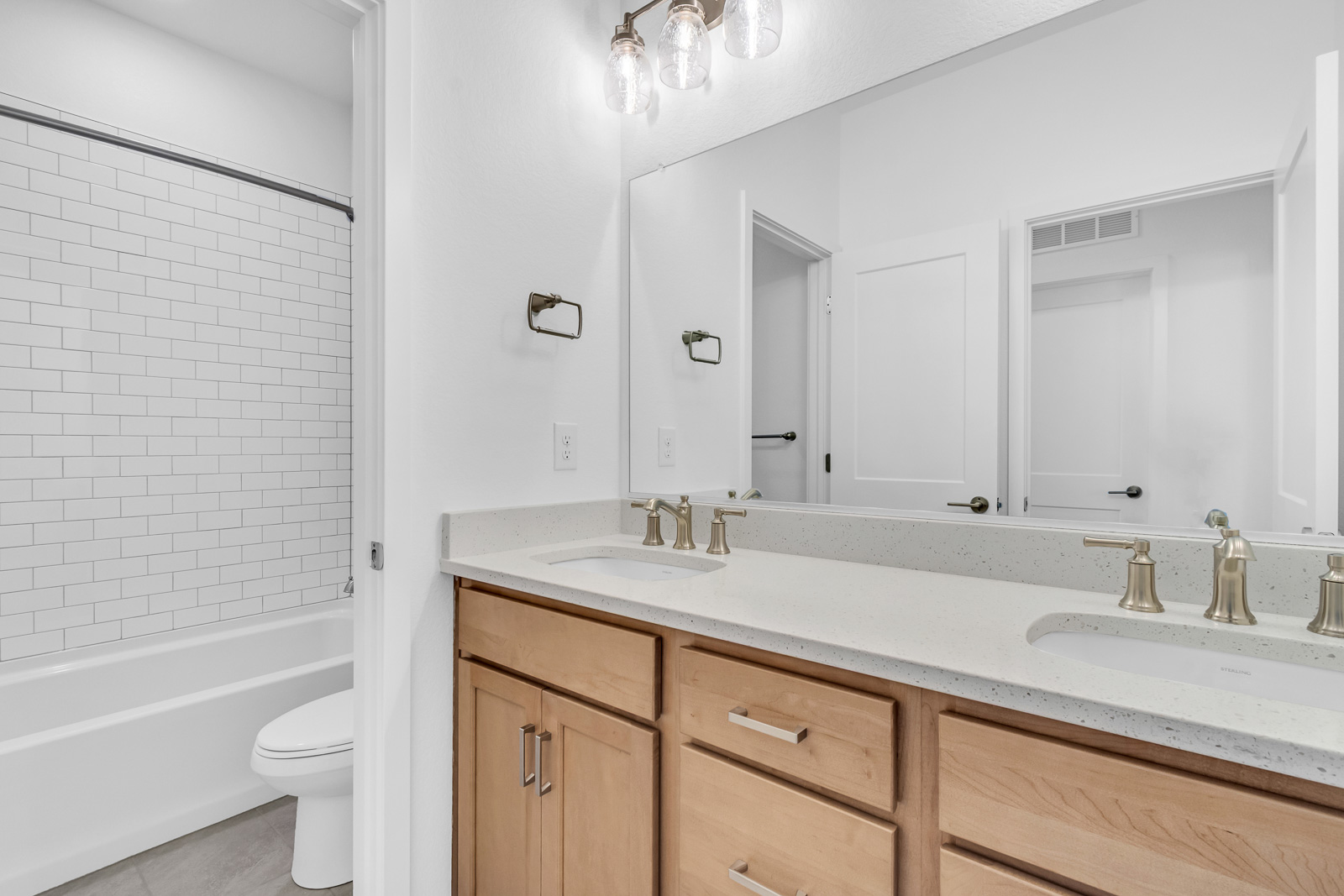 Bathroom real estate photography with clean design and natural lighting in Colorado